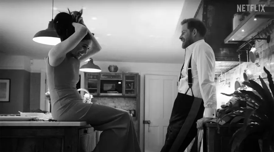 All of Meghan and Harry’s Personal, Never Before Seen Photos in Doc tying hair