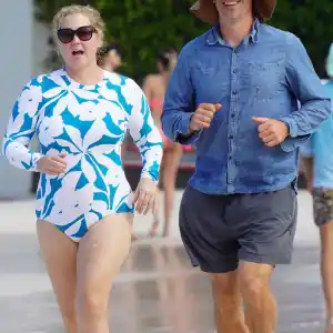 Amy Schumer and Husband Chris Fischer Are All Smiles During Beach Outing