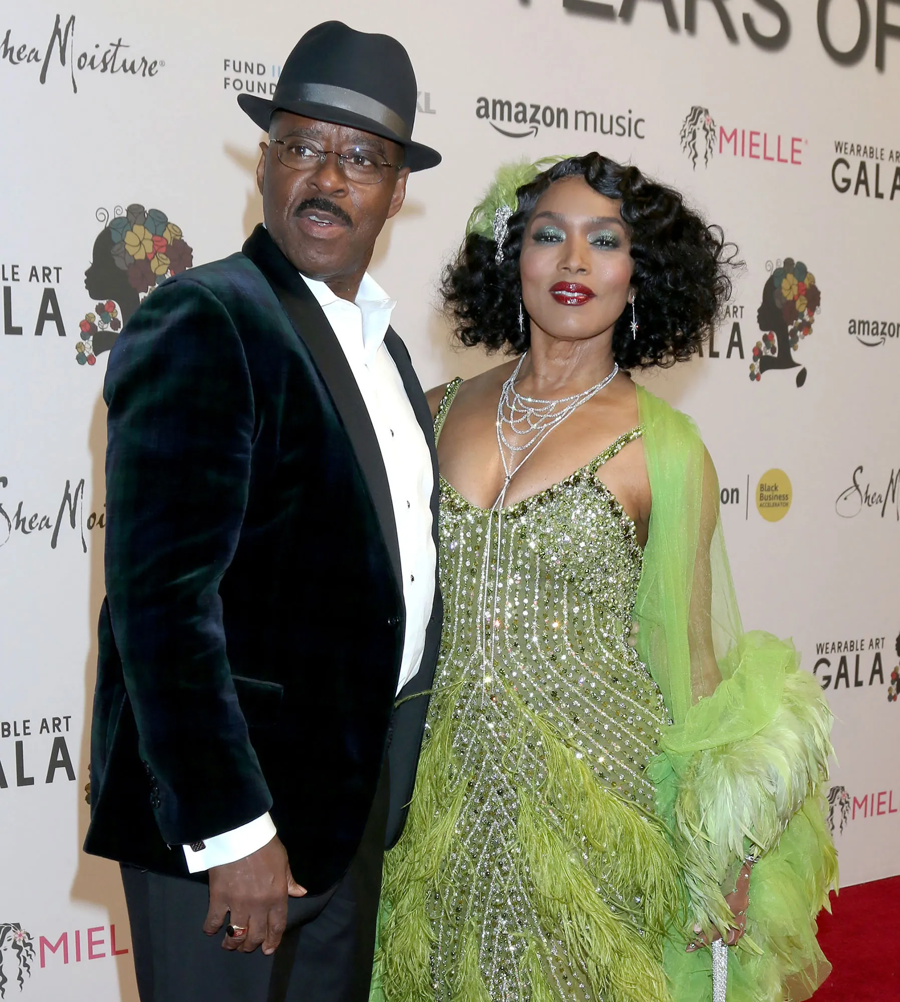 Angela Bassett and Courtney B. Vance green dress