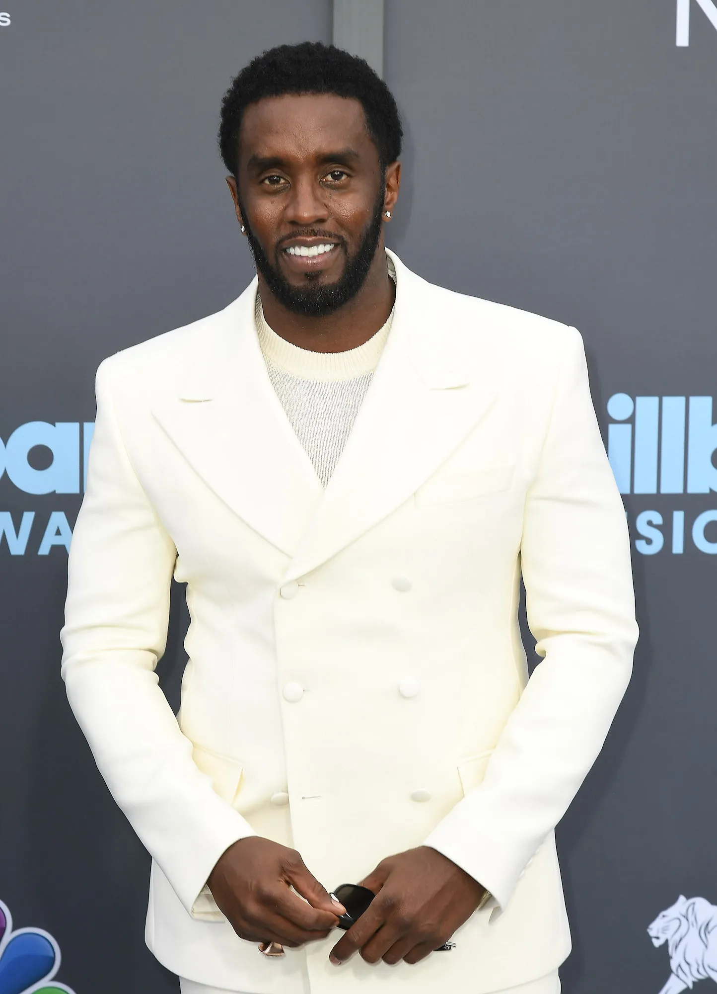 Diddy Shows Daughter Love for the 1st Time in Family Christmas Photo