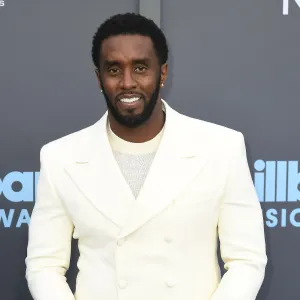 Diddy Shows Daughter Love for the 1st Time in Family Christmas Photo