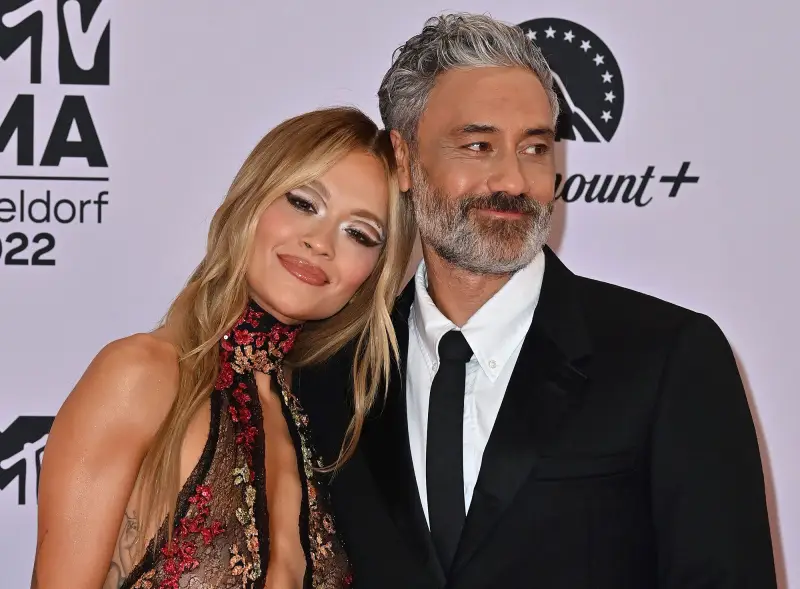 From 'Bestie' to Beau: Rita Ora and Taika Waititi's Relationship Timeline black suit