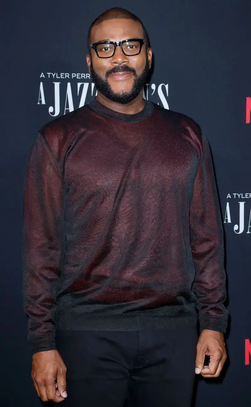 Jennifer Aniston, Steven Spielberg and More Celebs Who Are Godparents maroon shirt