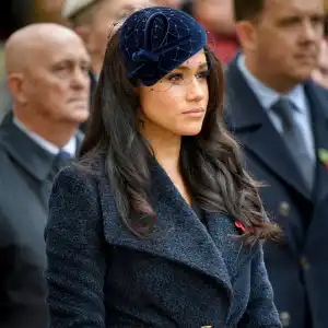 Meghan Markle Talks UK Wardrobe, Says She Wore Dark Colors to Fit in dark blue