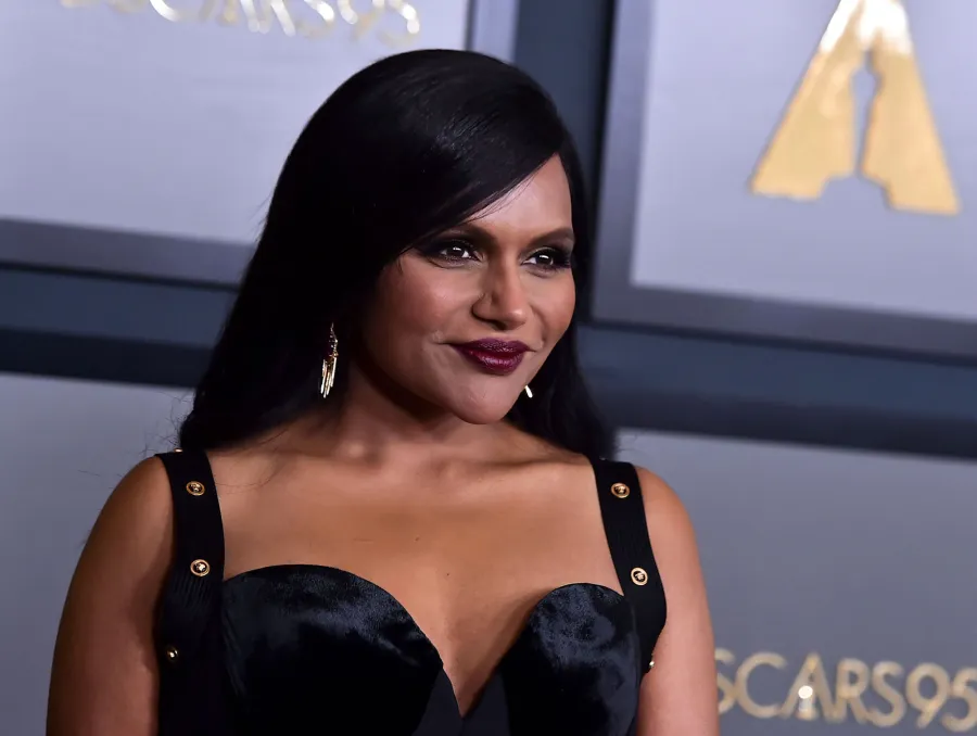 Mindy Kaling and B.J. Novak's Unbreakable Bond Through the Years black velvet dress