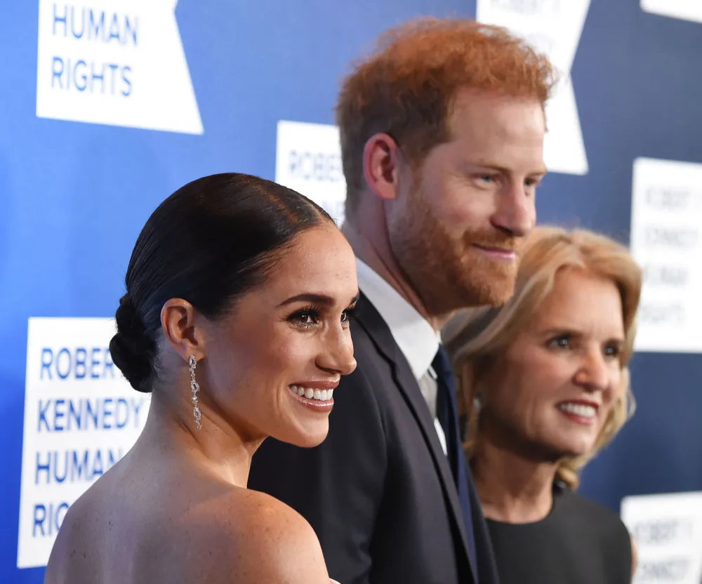 Prince Harry Reveals Royal Family Thought Meghan Markle Was Going Through a &lsquo;Rite of Passage&rsquo; With the U.K. Press: 'Why Should She Be Protected?' side view