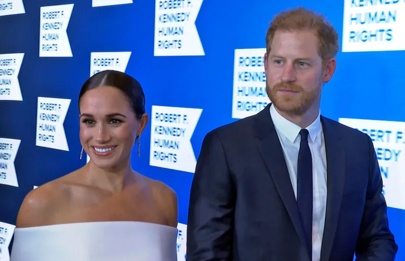 Prince Harry Says Family Thought He Was Still in Canada for 6 Weeks They Lived With Tyler Perry thin blue tie