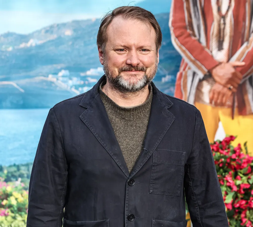 Rian Johnson Reveals Why He Is 'Pissed Off&lsquo; About the Title for 'Knives Out' Sequel 'Glass Onion&lsquo; sweater under blazer