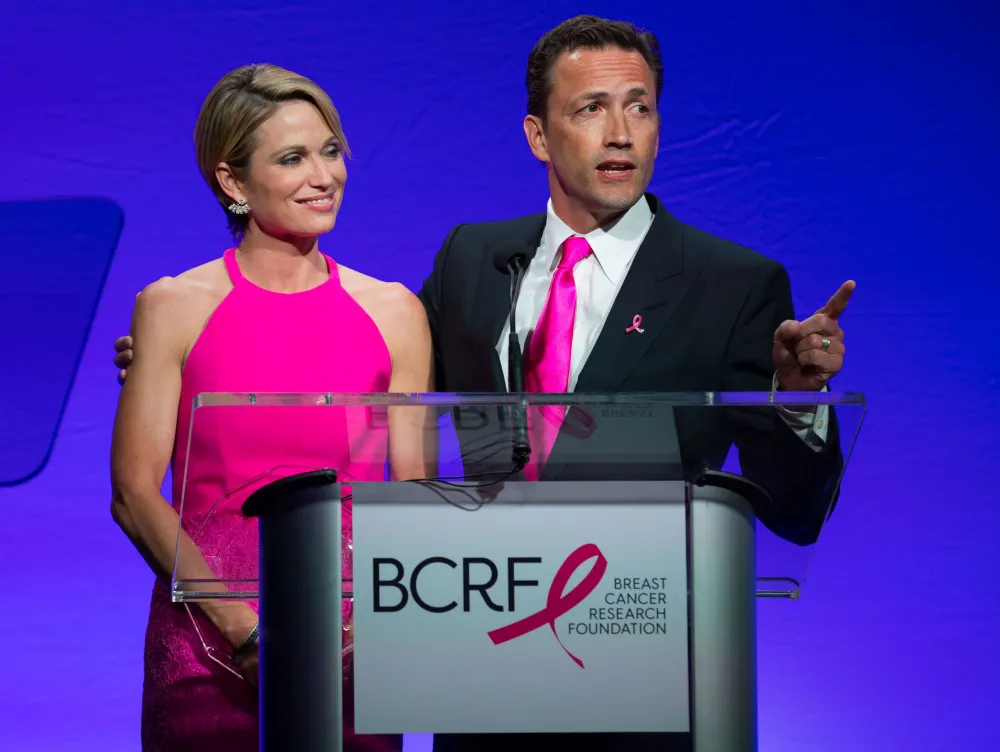 T.J. Holmes Said Amy Robach and Andrew Shue&rsquo;s Marriage Was a &lsquo;Love Story Like No Other&rsquo; on &lsquo;GMA3&rsquo; 1 Year Before Scandal breast cancer pink