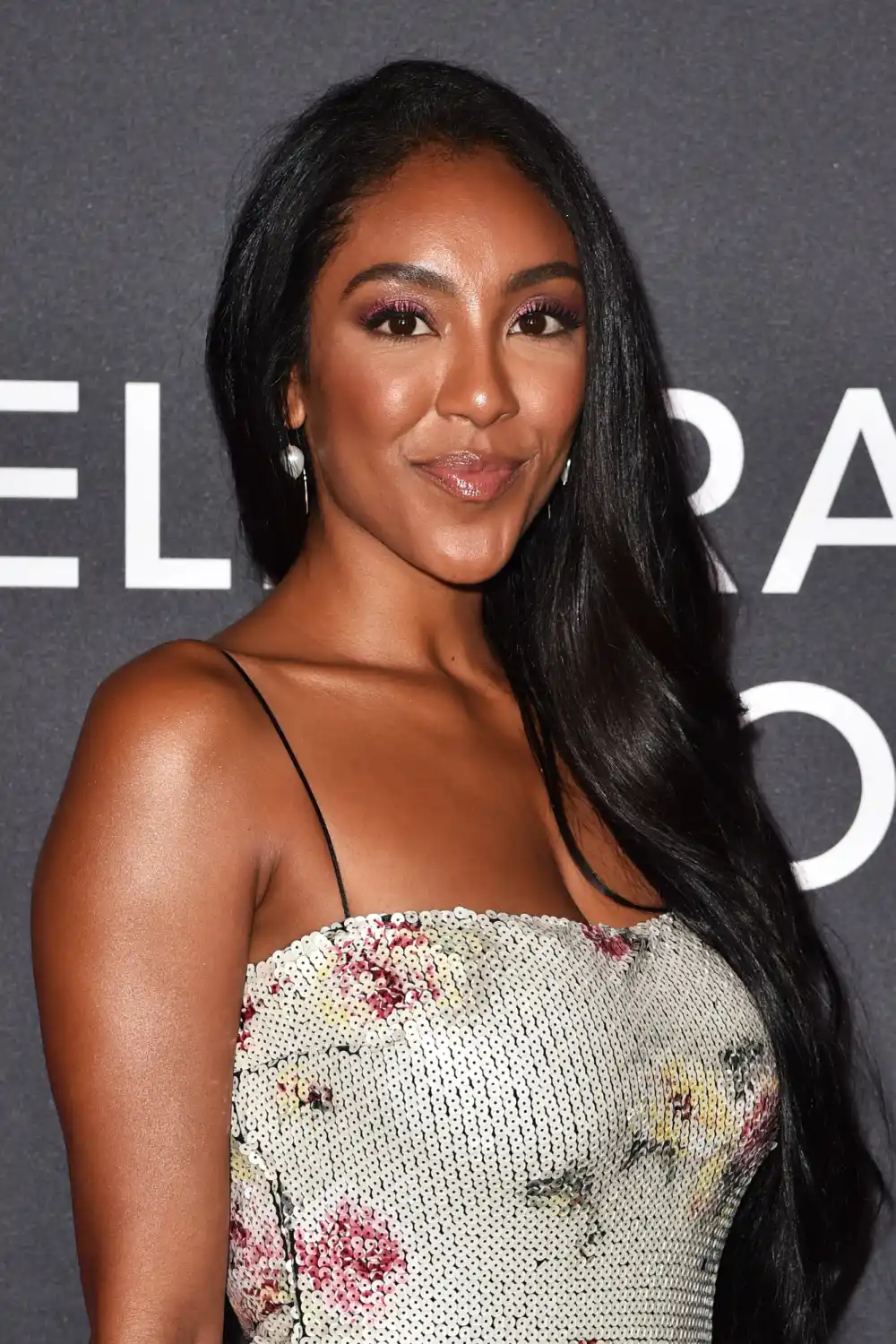 Tayshia Adams Creates Crossbody &lsquo;All Things Possible&rsquo; Purse for Ukraine Relief