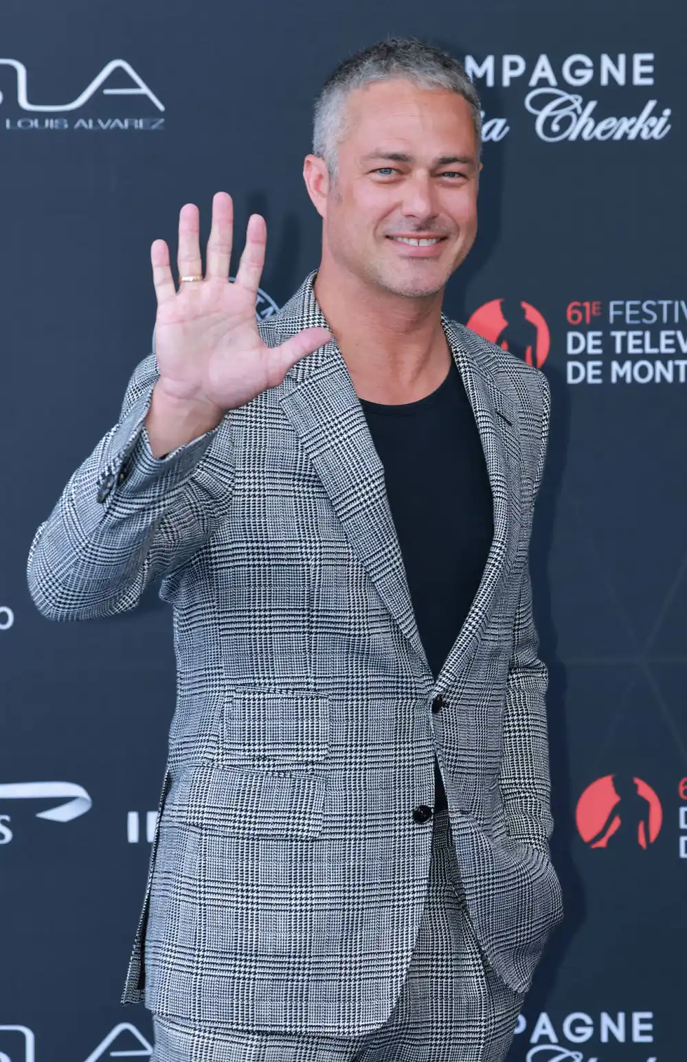 &lsquo;Chicago Fire&rsquo; Star Taylor Kinney Is Taking a Leave of Absence From Show After 11 Seasons: Reports waving