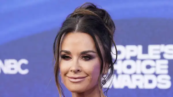 Kyle Richards Reveals Secret to Slimmed-Down Physique After Denying Using Weight Loss Drug Ozempic feathery dress