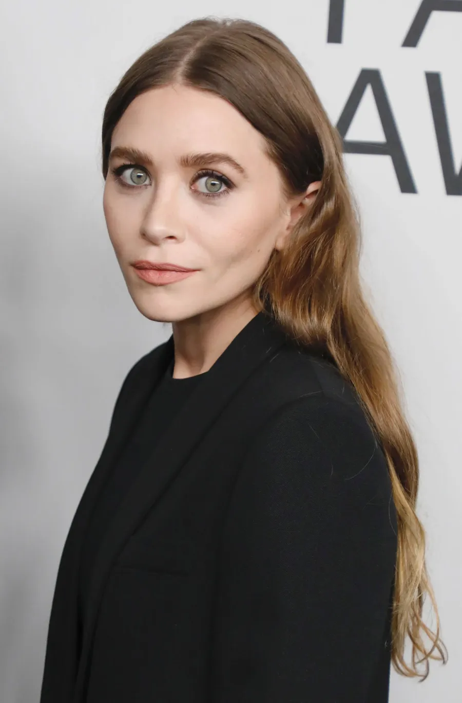 Ashley Olsen and Louis Eisner’s Relationship Timeline: Inside Their Private Romance hair down