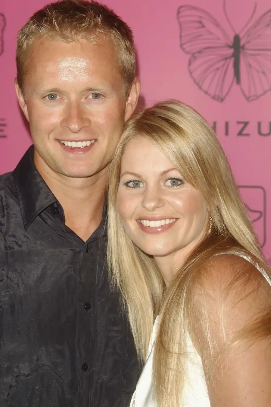 Candace Cameron Bure and Valeri Bure's Relationship Timeline black button up shirt