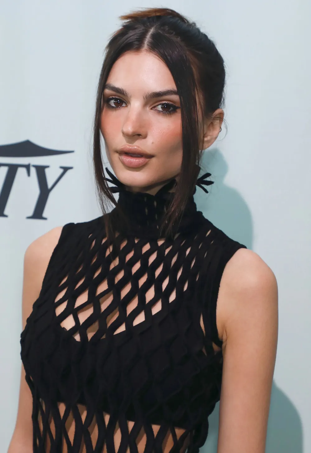 Emily Ratajkowski Opens Up About Dating &lsquo;Emasculated' Men Amid Split From Pete Davidson: &lsquo;I Feel Like I Attract The Worst Men&rsquo; fishnet dress
