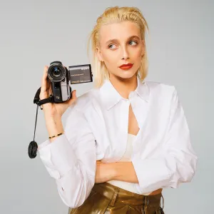 Emma Chamerlain New Face of Lancome holding camera