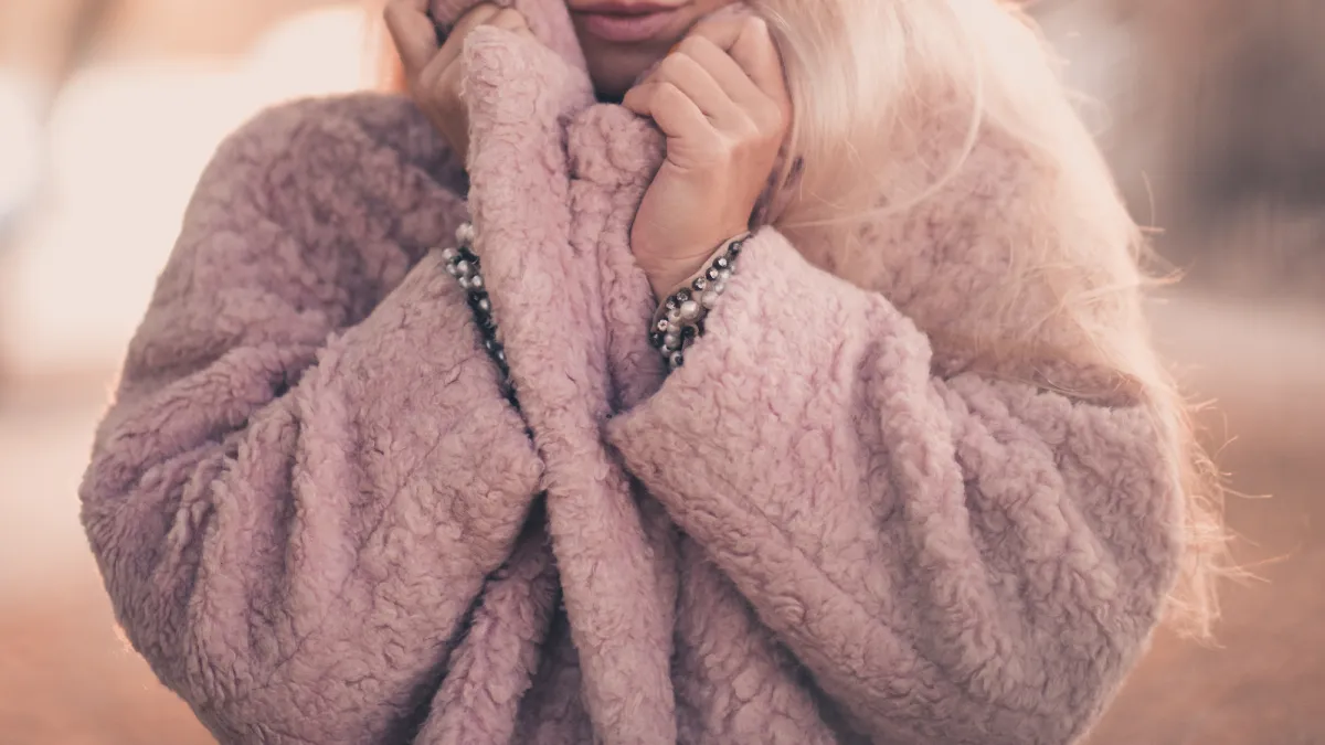 Faux-Fur-Cozy-Coat-Stock-Photo
