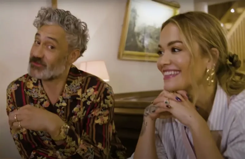 From 'Bestie' to Beau: Rita Ora and Taika Waititi's Relationship Timeline striped shirt