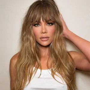 Khloe Kardashian Claps Back at Fan Who Implies Her Clip On Bangs Aren’t All She's Changed on Her Face- ‘Attacking Someone Is Sad’ - 691