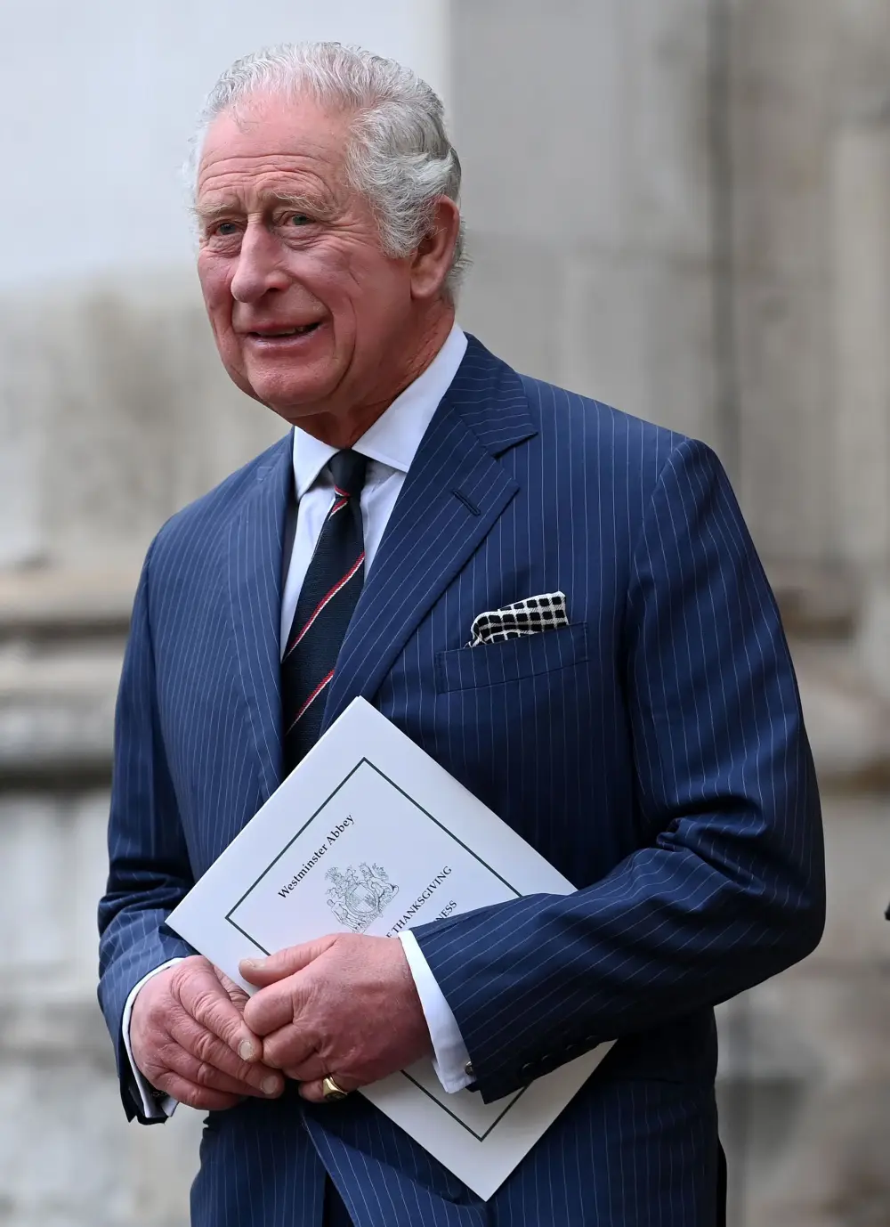 King Charles III and Prince William Are &lsquo;In Constant Talks&rsquo; With Royal Family About How to Handle Prince Harry&rsquo;s Memoir blue pin stripe suit