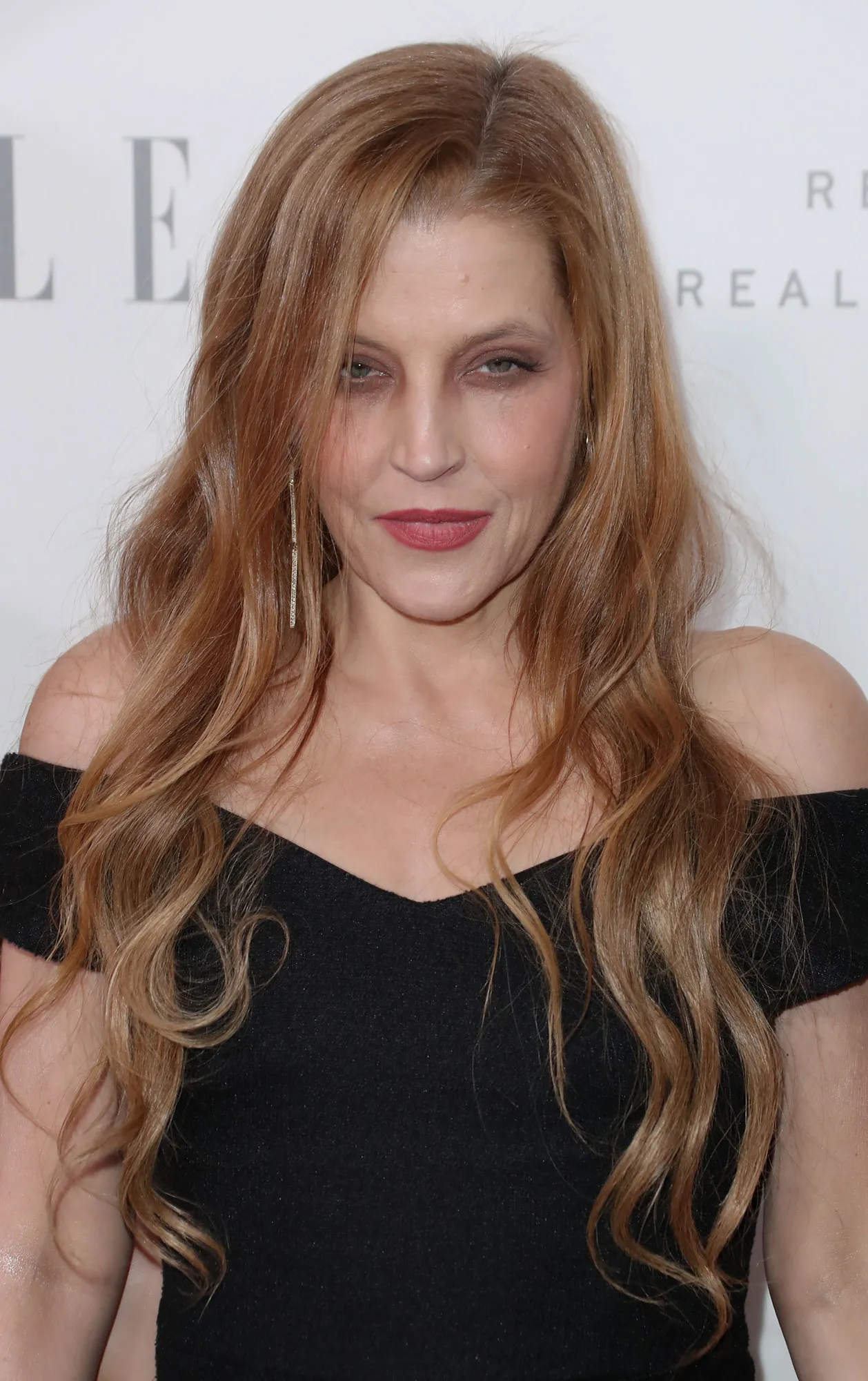 Lisa Marie Presley to Be Laid to Rest at Graceland Alongside Father Elvis Presley black dress 2017