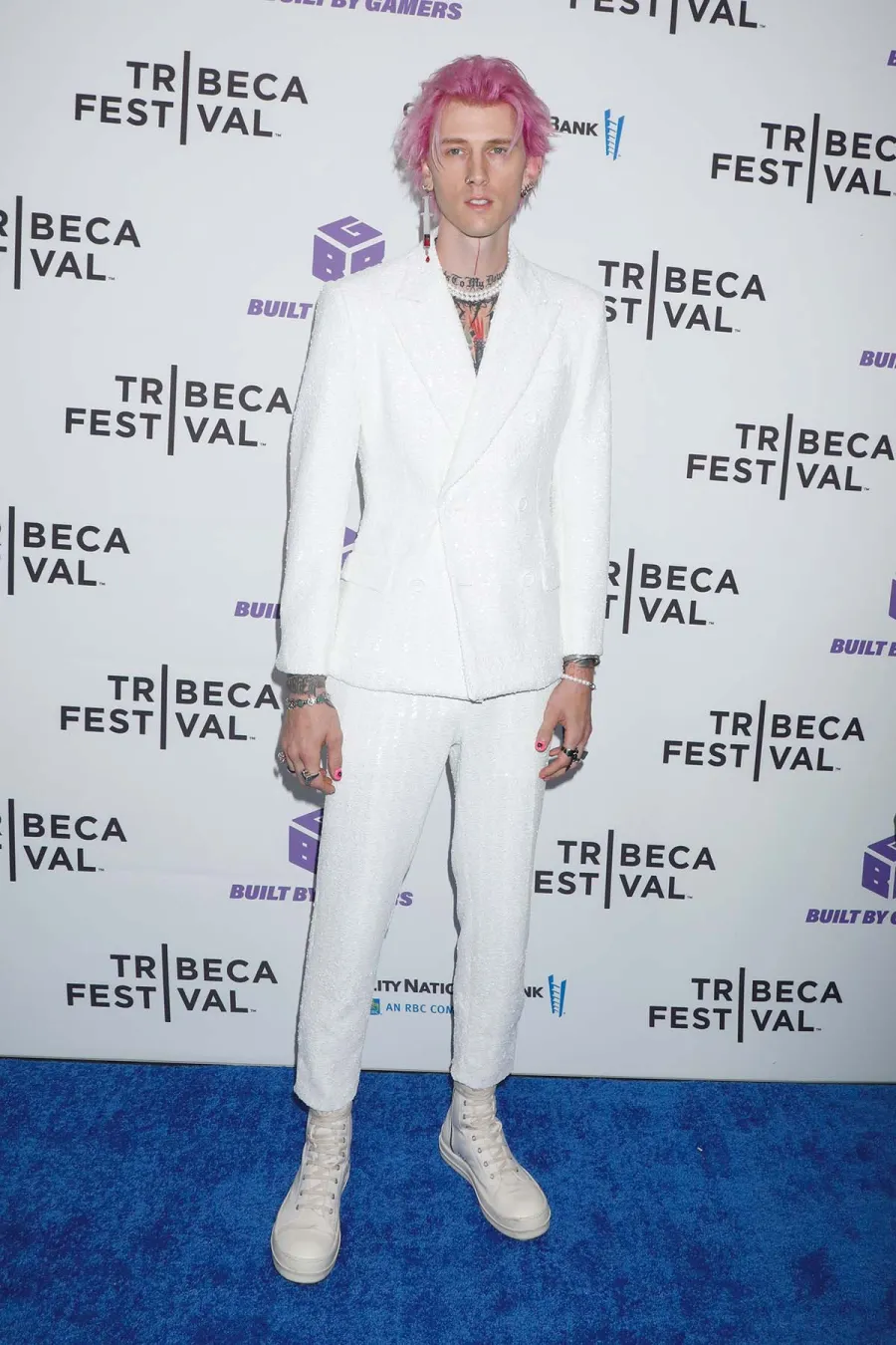 See Machine Gun Kelly’s Best Fashion Moments Through the Years: Pics