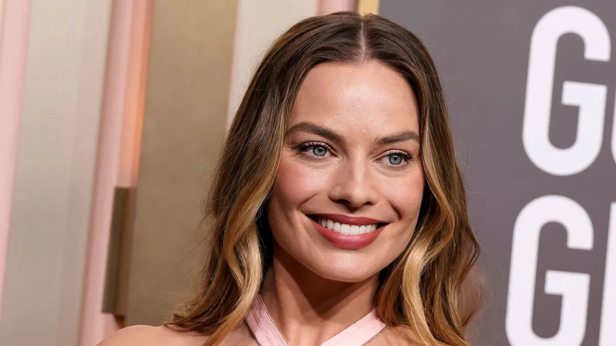 Margot Robbie Breakout Golden Globes 2023 open mouth smile