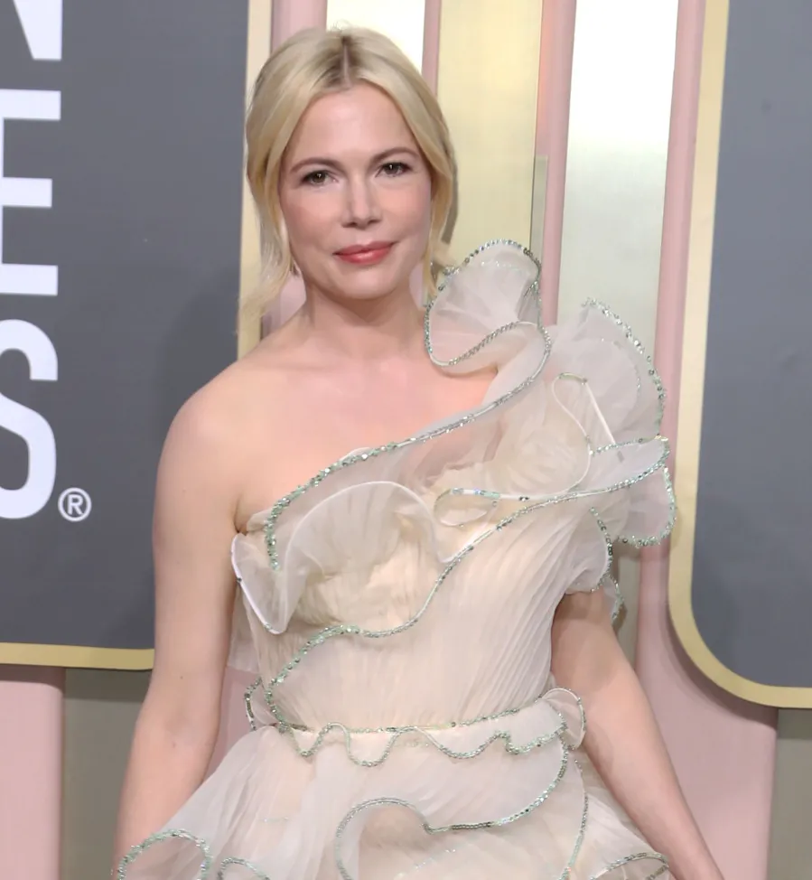Michelle Williams Attends 2023 Golden Globes After Welcoming 3rd Baby closed mouth smile