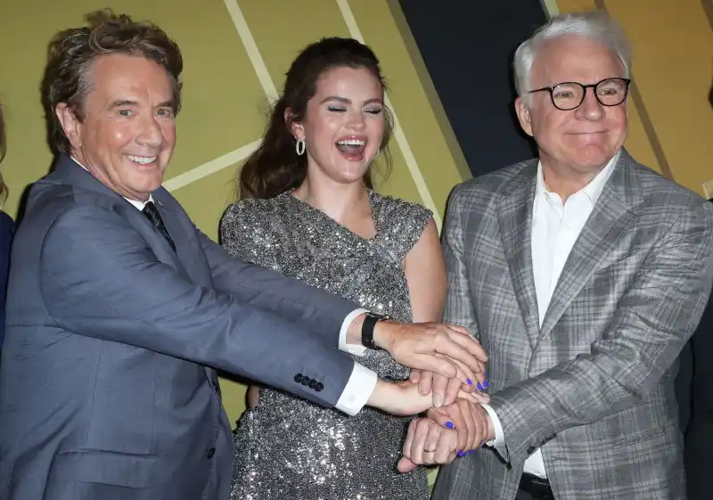 'Only Murders in the Building’ Cast’s Dating History: Selena Gomez, Steve Martin and More Stars’ Love Lives hands together