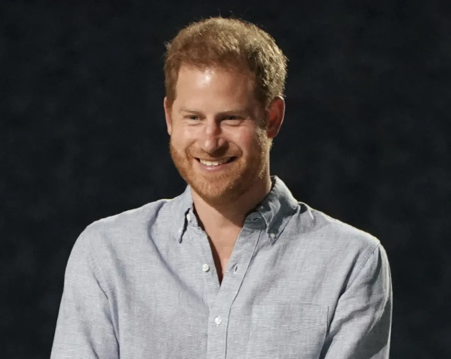 Prince Harry Through the Years: His Royal Life, Military Career, Fatherhood and More linen shirt
