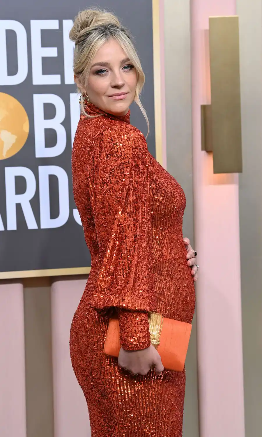 Pregnant Celebrities’ Baby Bump Hall of Fame in 2023: See Photos burnt orange dress
