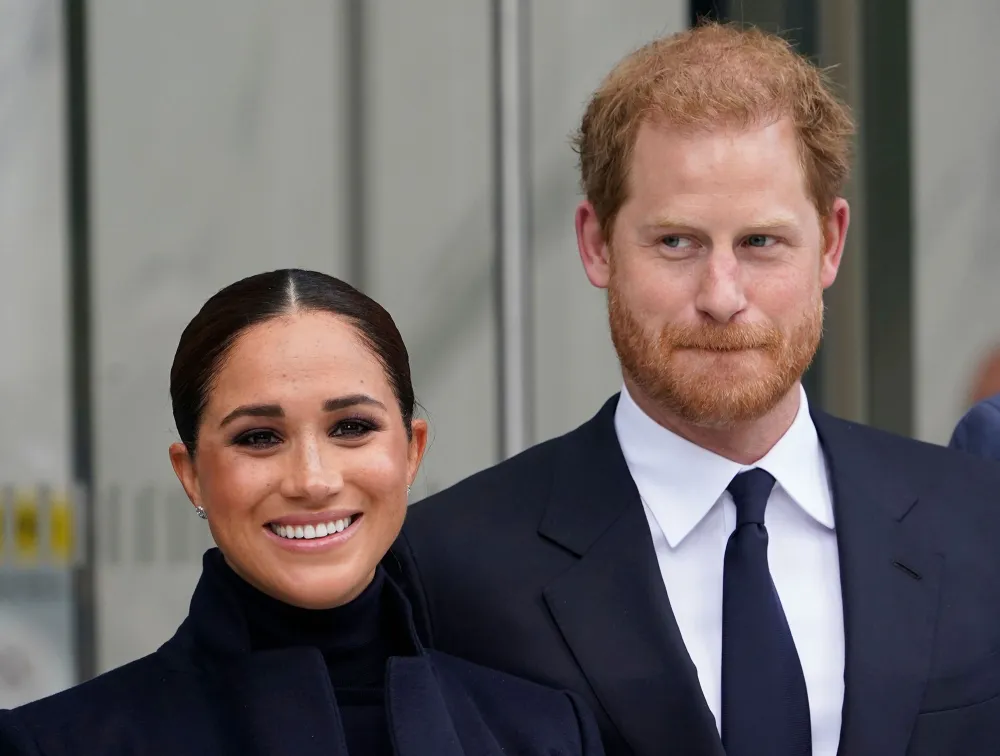 Prince Harry Shares That Meghan Markle Got Complimented for Her &lsquo;Deep&rsquo; Curtsy When Meeting Queen for 1st Time turtleneck and navy jacket