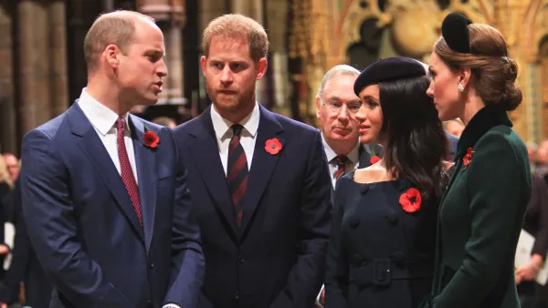 Prince Harry gestures in the gardens of Buckingham Palace in London kate green coat