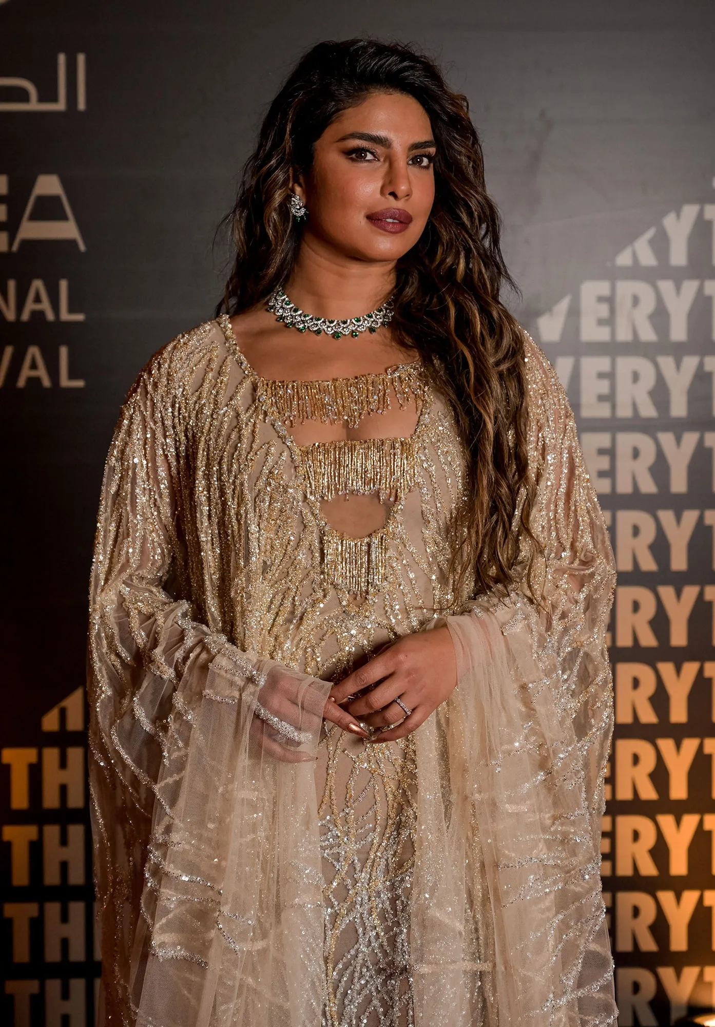 Priyanka Chopra Offers Rare Glimpse at Life as a Mother, Gushes Over Her Marriage to Nick Jonas gold dress