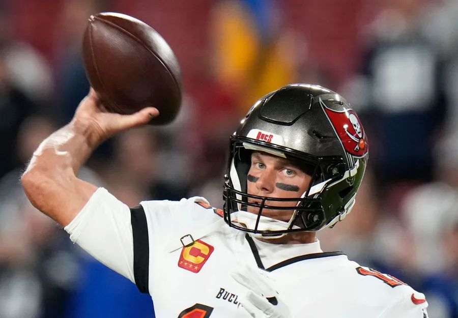 Tom Brady Drops F-Bombs When Asked About His NFL Future After Playoffs Loss: Don't Know 'What I'm F--king Doing' football in hand