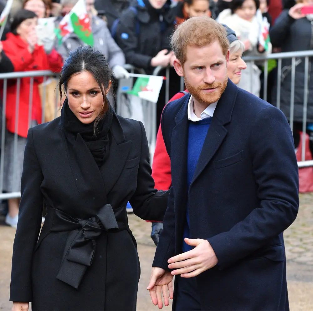 Why the Palace Might Not Strip Prince Harry, Meghan Markle's Titles- They're 'Not Trying to Throw More Grenades' - 378 Prince Harry and Meghan Markle visit Cardiff, Wales, UK - 18 Jan 2018