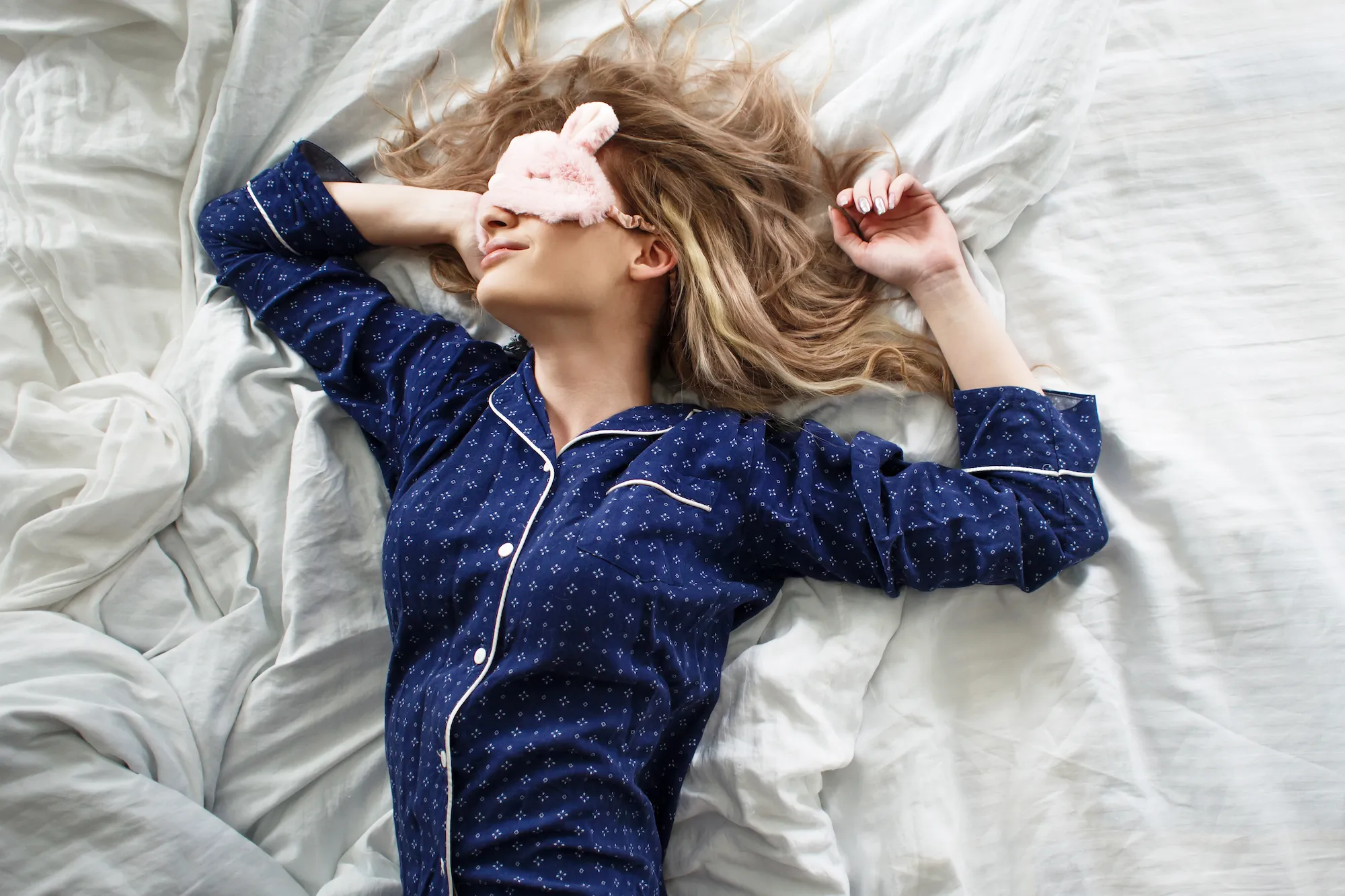 Woman-Sleeping-In-Bed-Stock-Photo