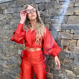 Brittany Matthews Rocks Red Two-Piece to Support Husband Patrick Mahomes' Kansas City Chiefs