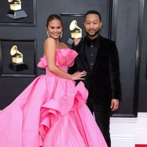 Chrissy Teigen Reveals She's Not at the 2023 Grammys, But Is 'Cheering On' Husband John Legend