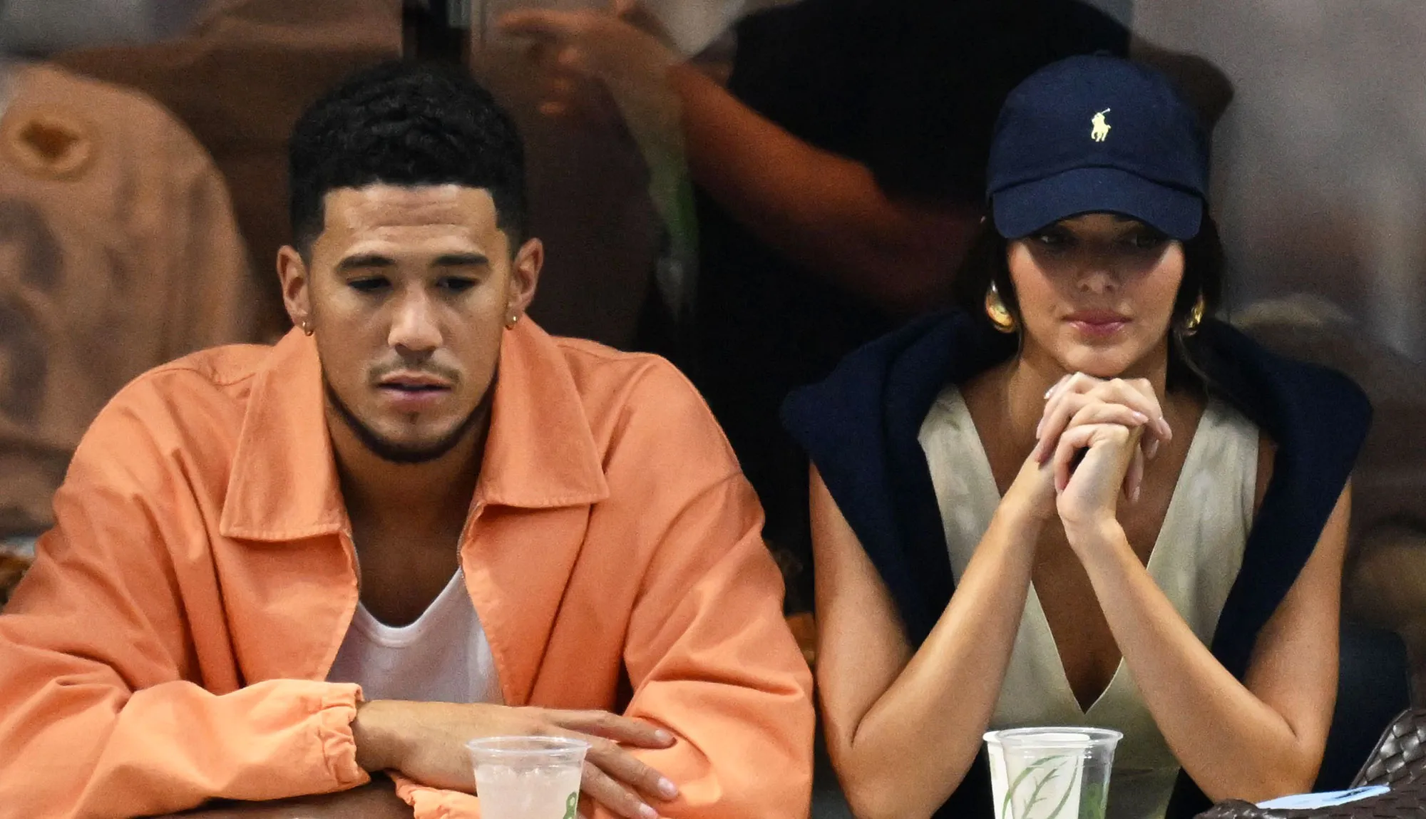 Devin Booker Is No Longer Following Kendall Jenner on Instagram orange jacket