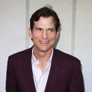 Getting Punk'd? Ashton Kutcher Puts Splash of Orange Juice in Coffee — Not Creamer: 'Gives It a Brightness' maroon suit