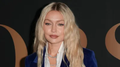Gigi Hadid Says Raising Daughter Khai Has Made Her 'Want to Feel More Settled': Motherhood 'Shifted My Life' blue velvet jacket
