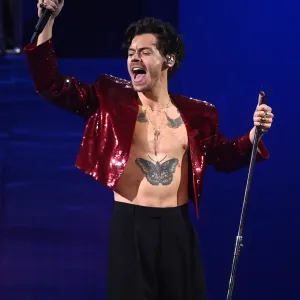 Harry Styles Sweeps at 2023 Brit Awards, Thanks Former One Direction Bandmates During Speech: Photos