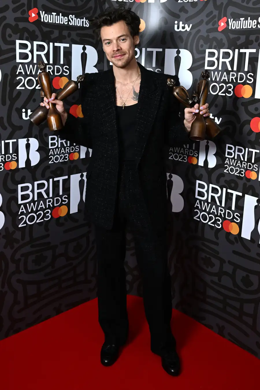 Harry Styles Sweeps at 2023 Brit Awards, Thanks Former One Direction Bandmates During Speech: Photos