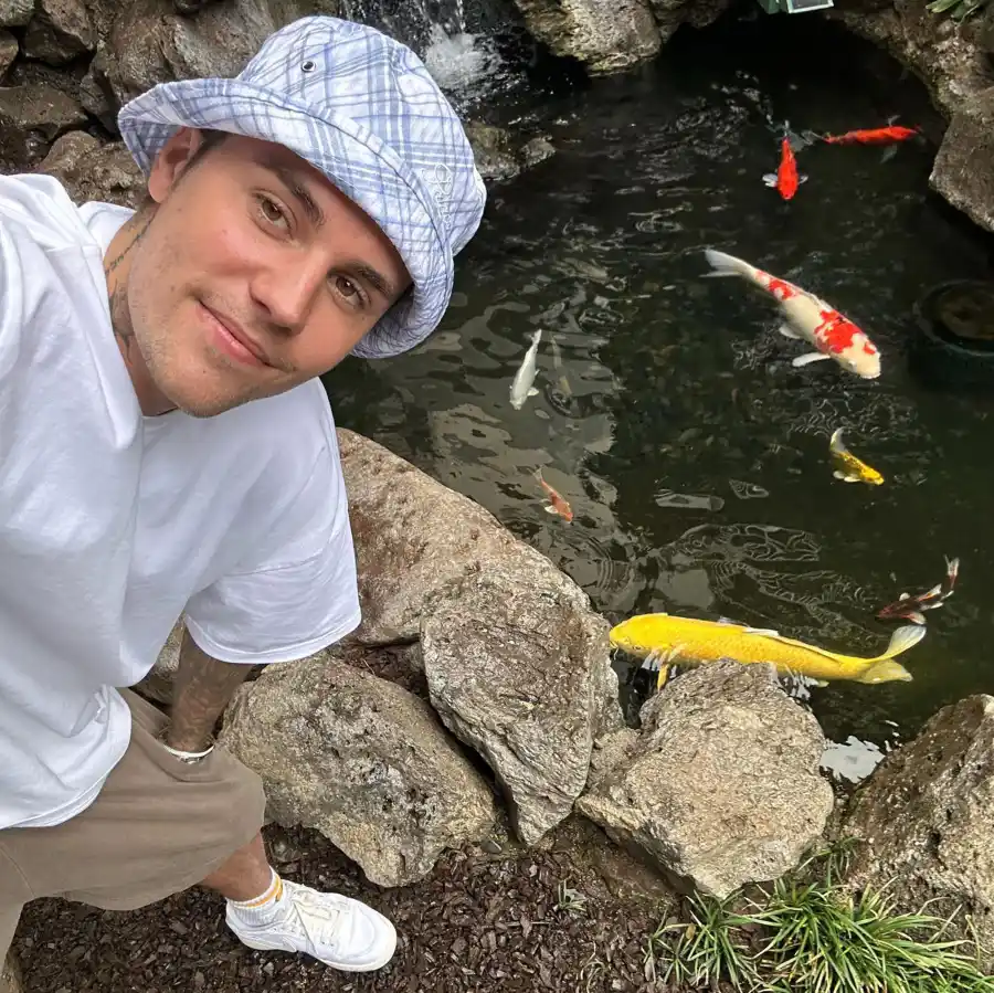 Justin Bieber Cozies Up With Wife Hailey Bieber on Hawaiian Getaway With Pals: Vacation Pics koi fish