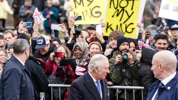 King Charles III Ignores Protestors With 'Not My King' Signs Outside Royal Engagement in London