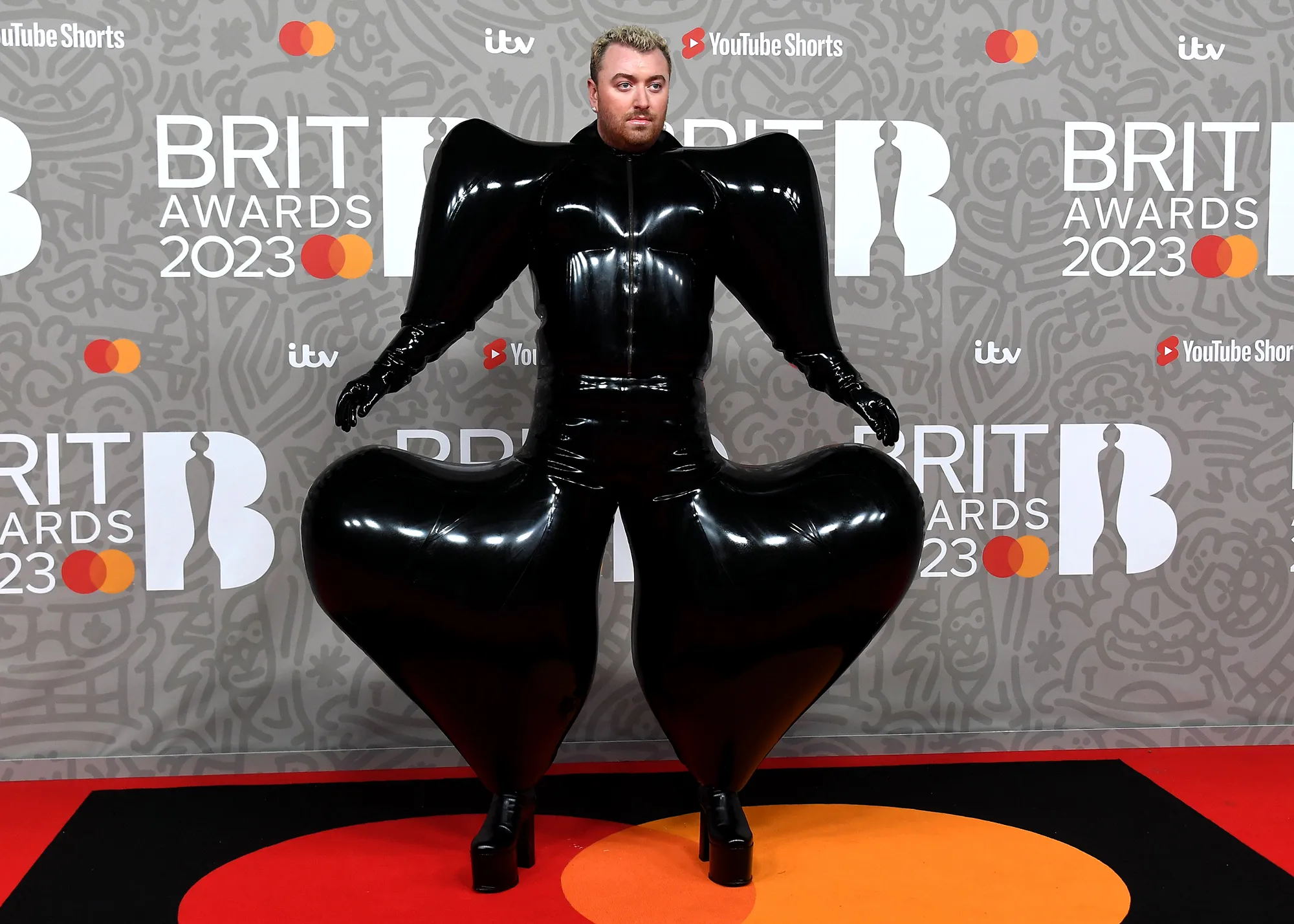 Sam Smith Rocks at Latex Jumpsuit at the 2023 Brit Awards: See Red Carpet Photos