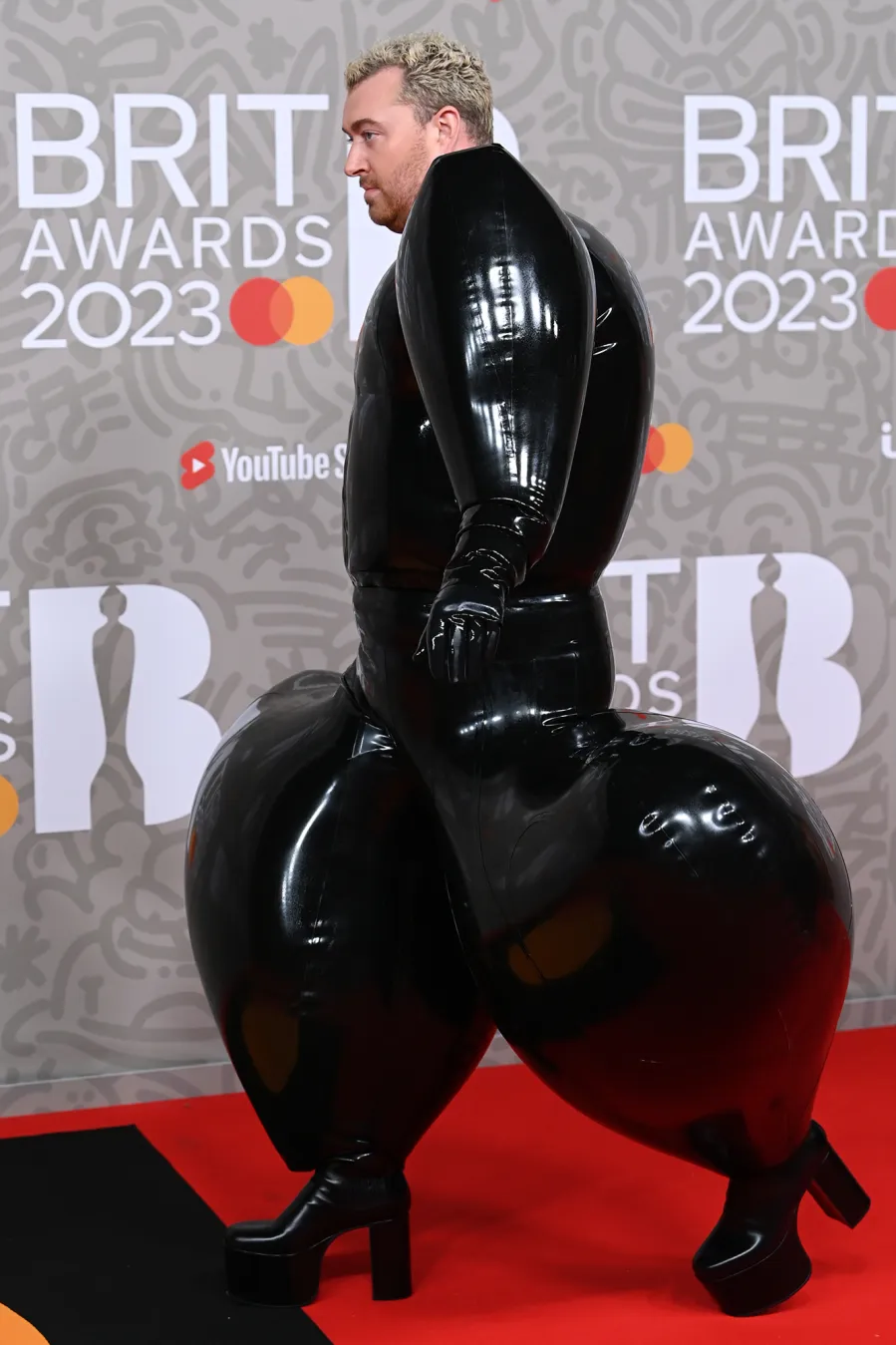 Sam Smith Rocks at Latex Jumpsuit at the 2023 Brit Awards: See Red Carpet Photos