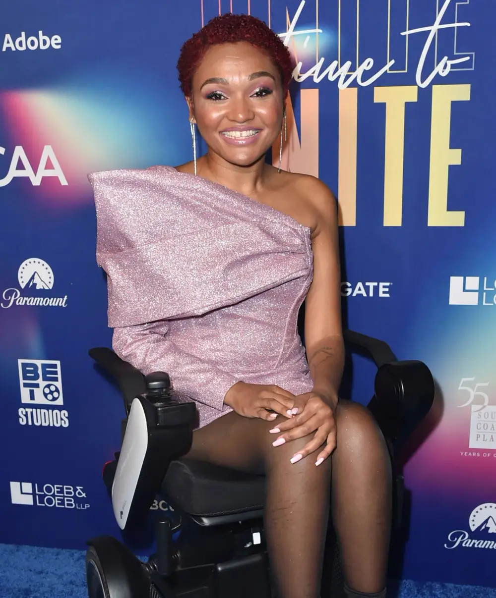 Sex Lives of College Girls&rsquo; Lauren &lsquo;Lolo&rsquo; Spencer Reacts to Kimberly and Whitney&rsquo;s Love Triangle: 'Literally a Violation' lavender gown