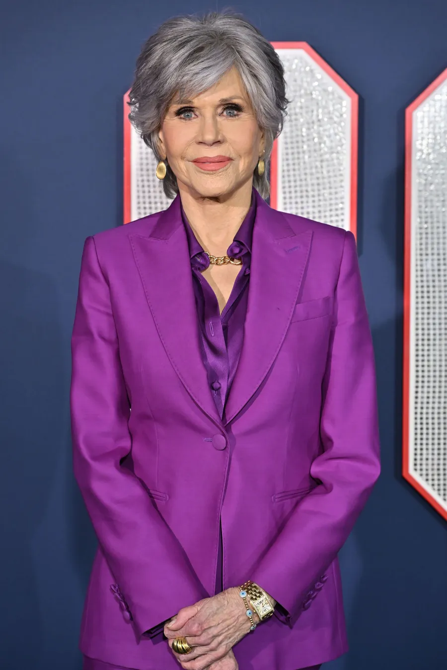 Stars Who've Battled Eating Disorders: Taylor Swift, Laurie Hernandez and More purple suit